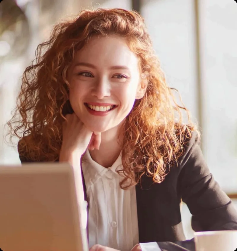 Person practicing mindfulness at work desk, integrating spirituality into daily career